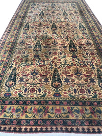 Fine Hand Knotted Turkish Hereke rug 5' X 9'